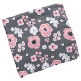 Charcoal flower baby box set muslin blanket view.