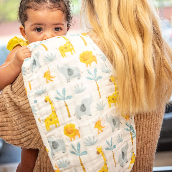 Baby with zoo muslin burp cloth