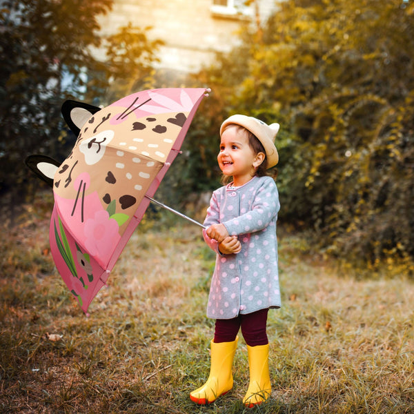 Little girl with leopard pop up umbrella