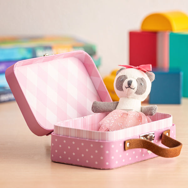 Panda teeny travel buddy on a table
