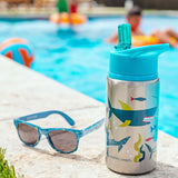Shark flip top stainless steel bottle by the pool.
