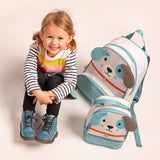 Little girl with dog sidekick backpack