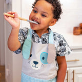 Little boy wearing Puppy apron