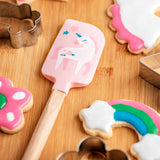 Unicorn spatula and cookie cutter set being used