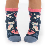 Child wearing cat toddler socks
