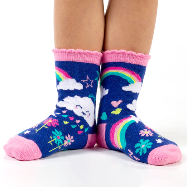 Child wearing rainbow toddler socks