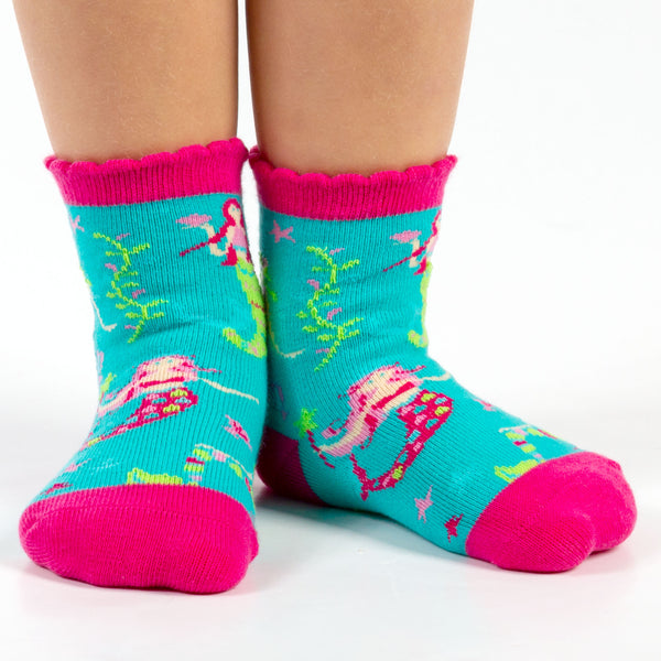 Child wearing mermaid toddler socks