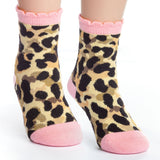 Child wearing leopard toddler socks