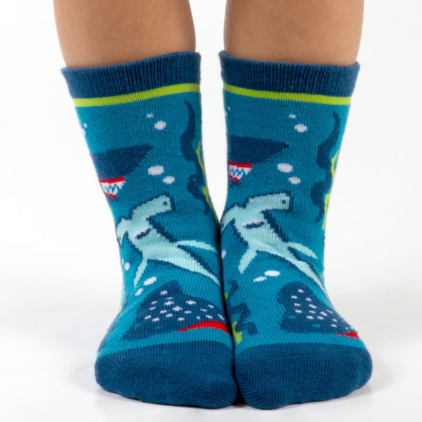 Child wearing shark toddler socks