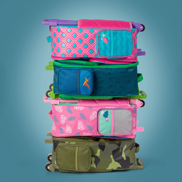 Classic rolling luggage's stacked on top of each other