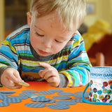 Little boy playing with boy memory game set