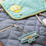 Air plane/hot air balloon quilted backpack zipper pull