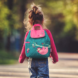 Little girl wearing sloth quilted  backpack 