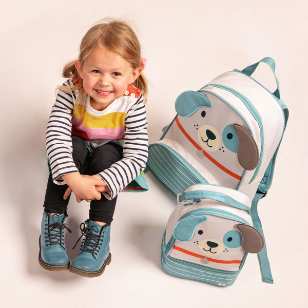 Little girl with dog sidekick backpack 
