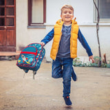 Young boy swinging space classic backpack.